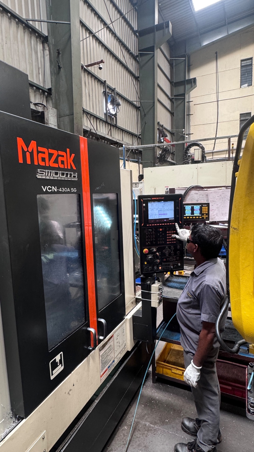 Sanyog operator working at a Mazak machining centre
